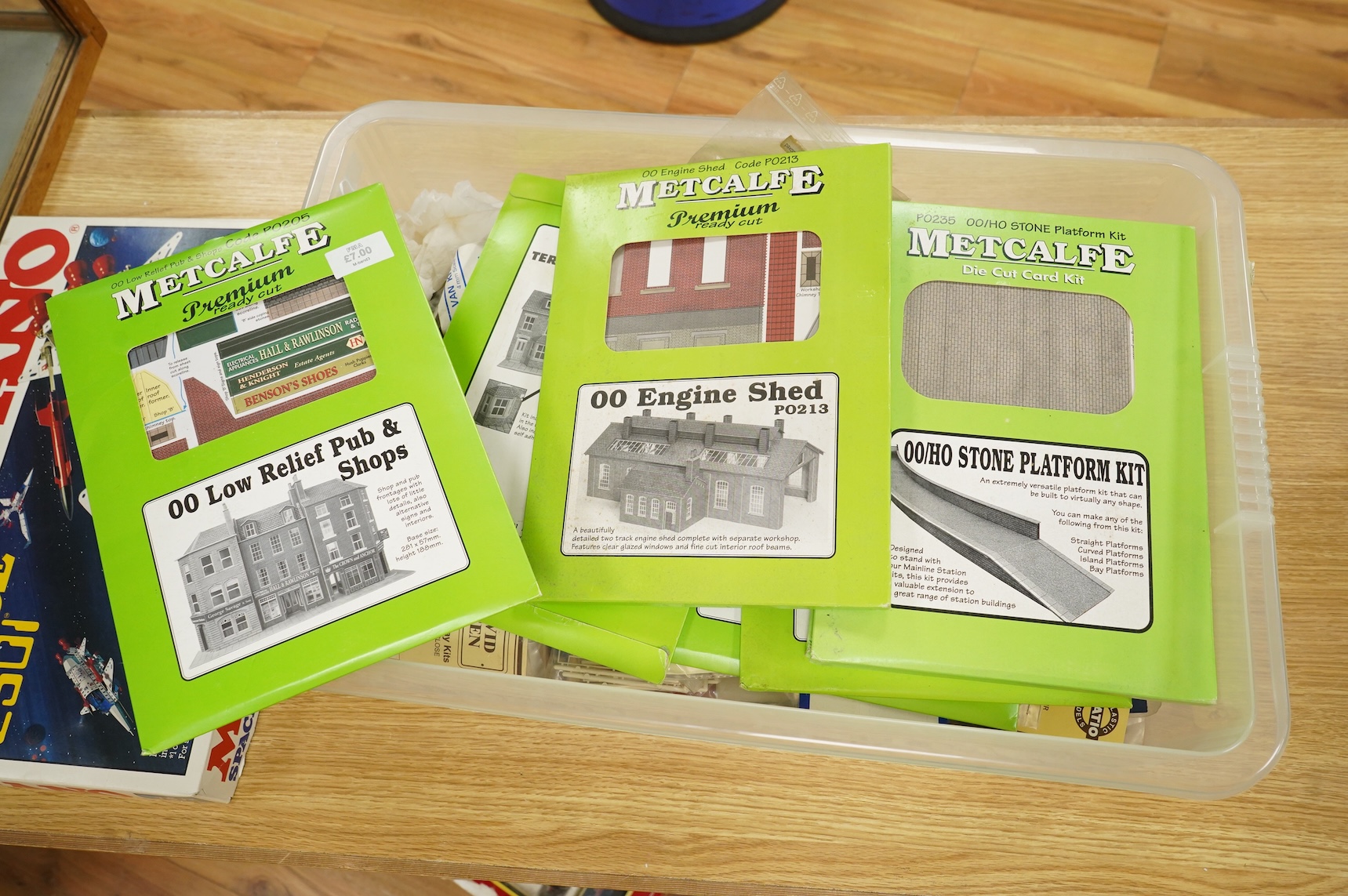 A collection of 00 gauge model railway, including three box train sets by Jouef, Mainline and Hornby, together with a large selection of unconstructed railway related plastic and metal kits and accessories, manufacturers